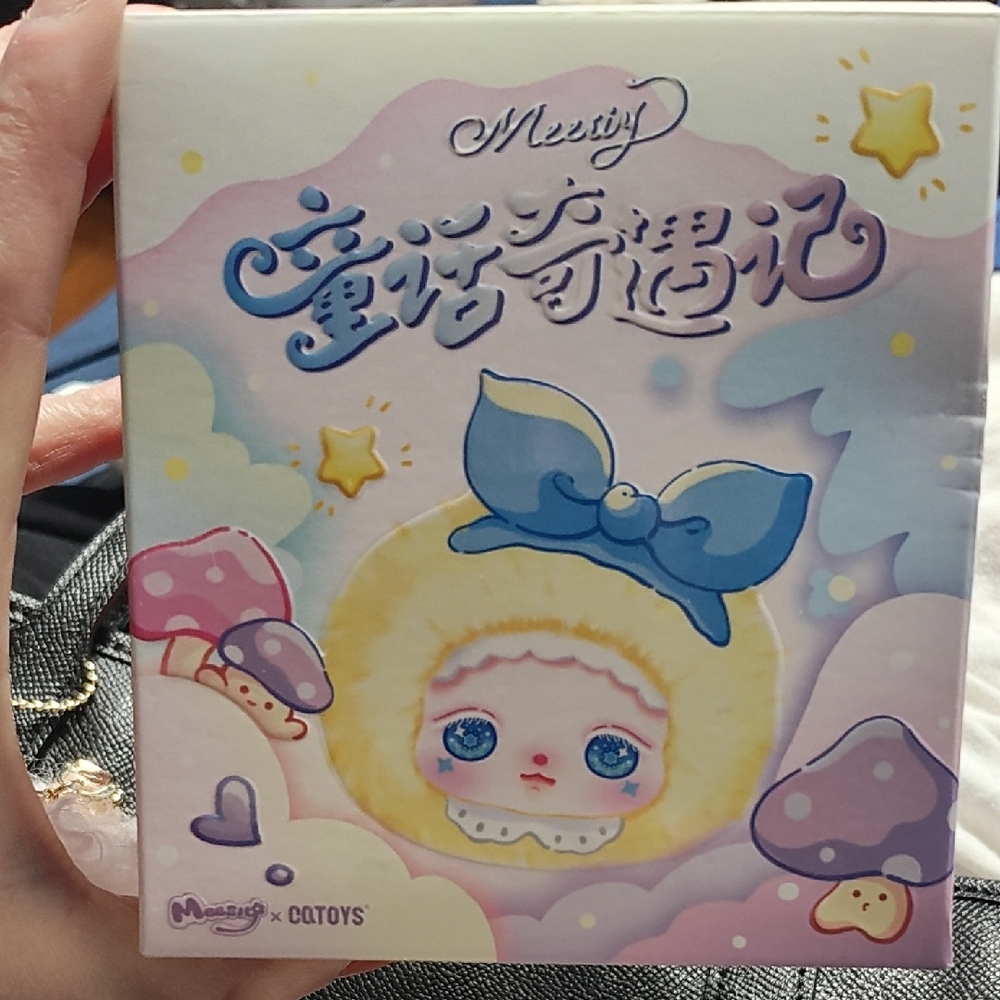 Merry Doll with Blue Bow